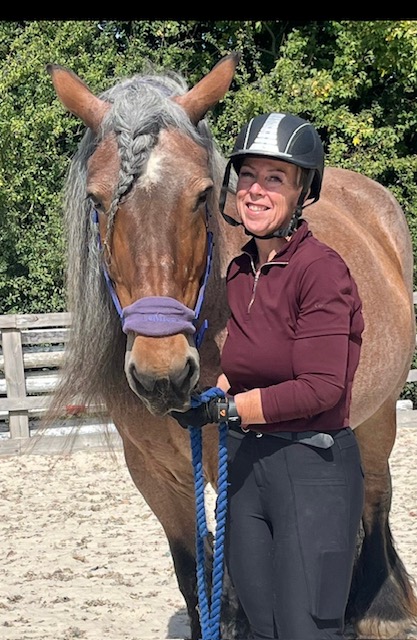 Lisa Halls with a gentle horse at the stables